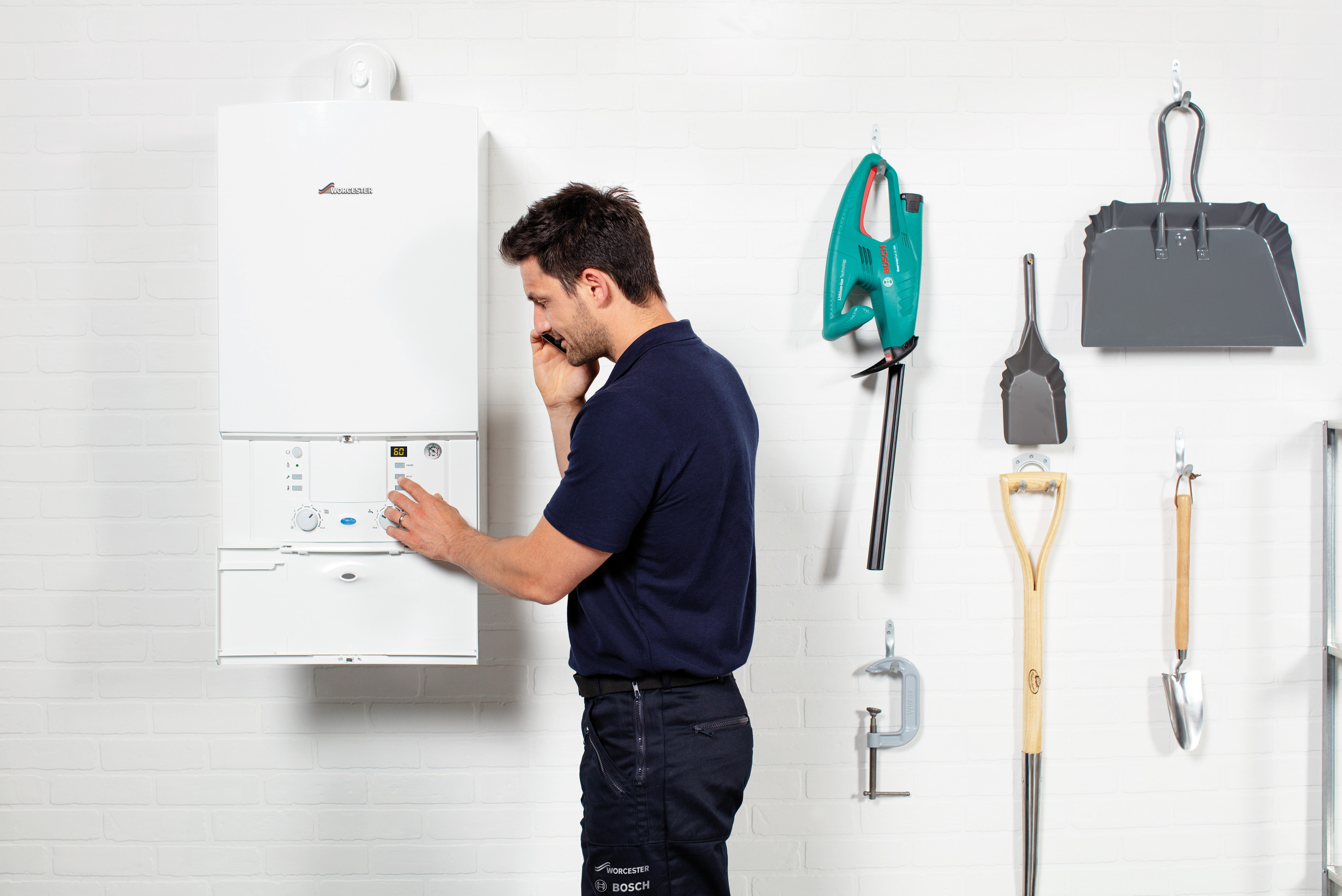 Engineer fixing a broken boiler