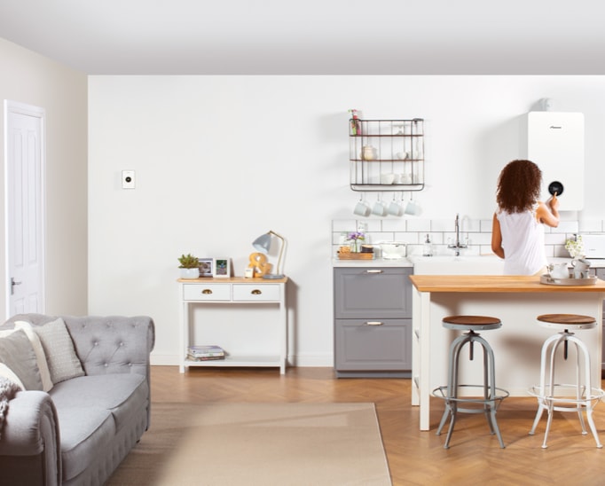 woman checking boiler