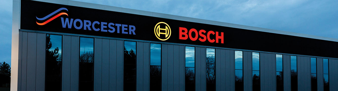 Worcester Bosch Head Office sign outside at night