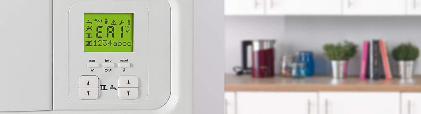 Closeup photo of a boiler control panel with an error message displayed.