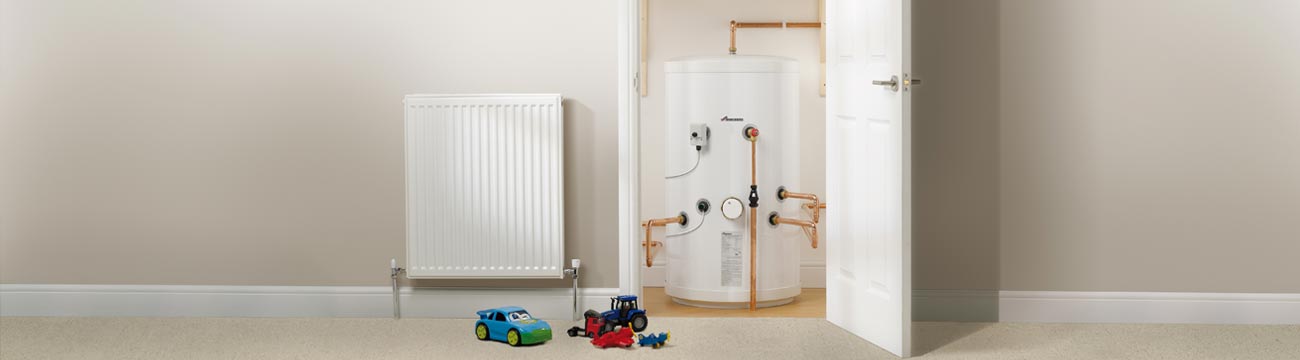 Photo of a bedroom with an open door exposing a cylinder.